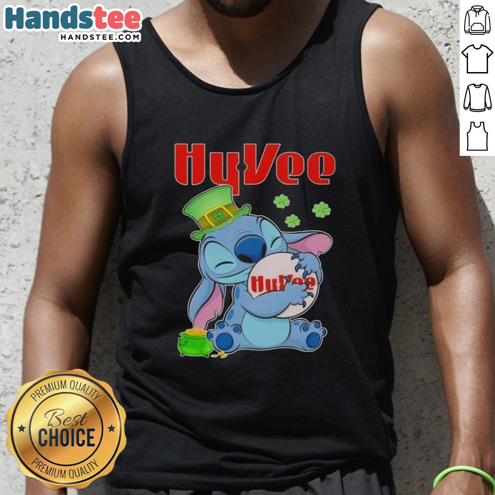 Alt Text: Cute Stitch hugging Hy-Vee logo on a St. Patrick's Day tank top, perfect for festive celebrations and casual wear.