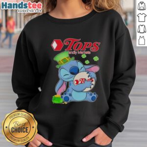 Alt Text: Cute Stitch Hug Tops Friendly Markets logo on a St. Patrick's Day sweatshirt, featuring festive green and shamrock designs.