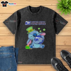 Cute Stitch hugging USPS logo on a St. Patrick's Day washed t-shirt, perfect for festive celebrations.