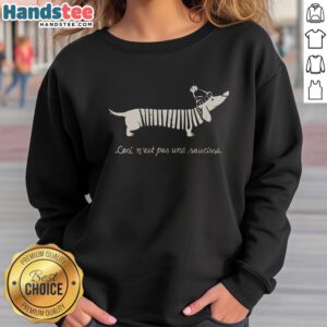 Good Ceci N'est Pas Une Saucisse sweatshirt featuring playful text design, perfect for casual wear and unique fashion statements.
