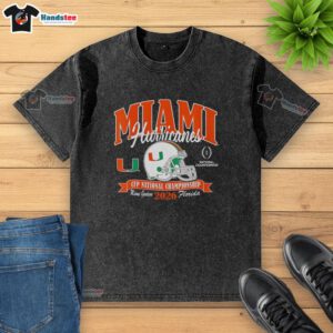 Miami Hurricanes CFP National Championship 2026 helmet and washed t-shirt displayed together, showcasing team spirit.