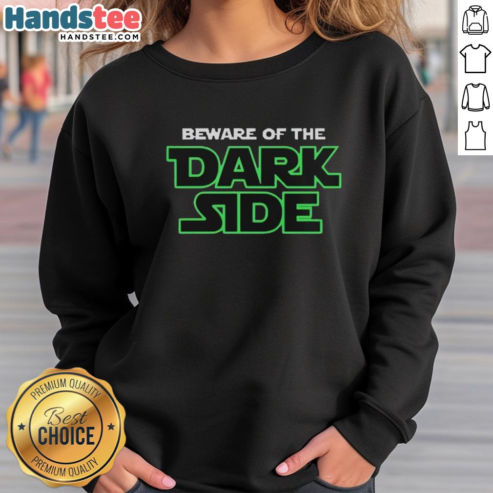 Premium Seattle Seahawks 'Beware of the Dark Side' sweatshirt featuring bold graphics and team colors for fans.