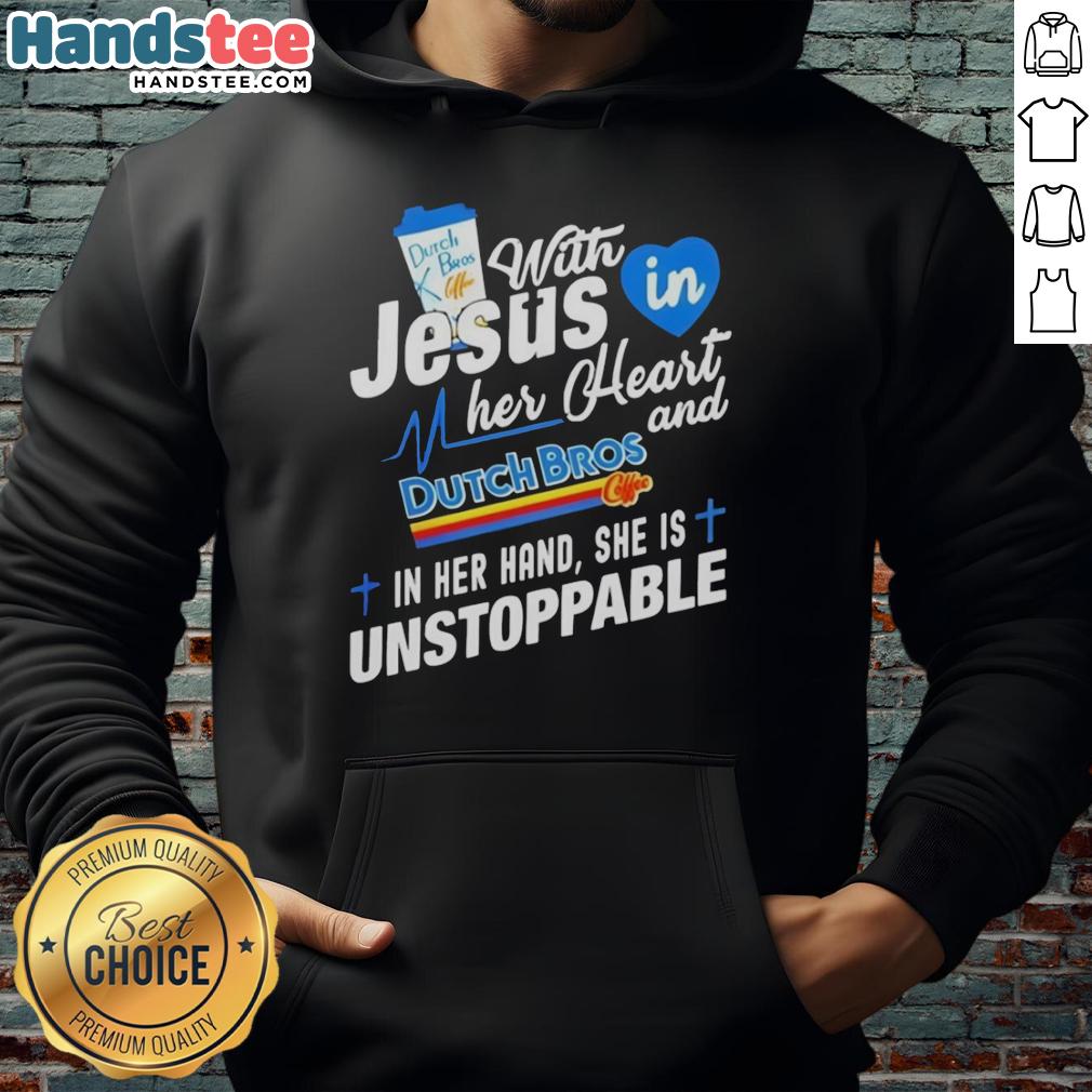 Young woman wearing 'Unstoppable' hoodie, holding Dutch Bros cup, embodying faith and positivity with vibrant background.