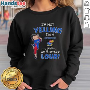 Girl wearing a Kansas Jayhawks sweatshirt that says 'Pretty I'm Not Yelling, I'm Just Talking Loud' in vibrant colors.