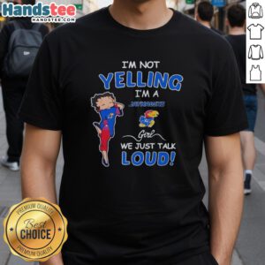 Pretty Kansas Jayhawks girl wearing 'I'M Not Yelling I'M Just a Fan' T-shirt, showcasing team spirit and style.