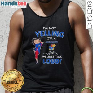 Girl wearing 'Pretty I'm Not Yelling I'm Kansas Jayhawks' tank top, showcasing team spirit and vibrant colors.