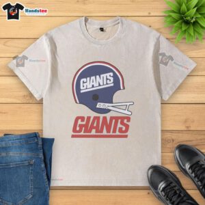 Alt Text: Awesome New York Giants football logo on a big helmet graphic displayed on a washed t-shirt design.