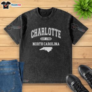 Varsity washed t-shirt featuring 'Nice Charlotte North Carolina Est. 1768' design, perfect for casual wear.