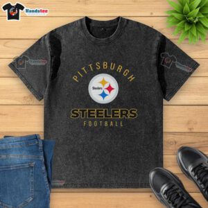 Alt Text: Nice Pittsburgh Steelers football logo washed t-shirt featuring a vintage design in black and gold colors.