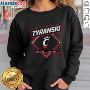 Ryan Tyranski wearing a Cincinnati Bearcats baseball sweatshirt, showcasing team spirit and style.