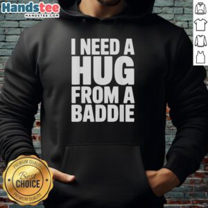 Alt Text: Official I Need A Hug From A Baddie Hoodie in stylish black with bold text design, perfect for casual streetwear.