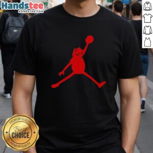 Official Jordan Frogs Jump Dunkman Kermit Parody T-Shirt featuring a playful frog dunking in a stylish design.