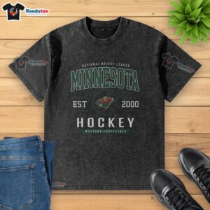 Official Minnesota Wild Hockey Legacy Crest Washed T-Shirt in green, featuring the team's logo and vintage design.