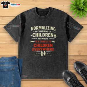 Official Normalizing The Harming Of Children Anywhere Is A Threat To Children Everywhere washed t-shirt design.