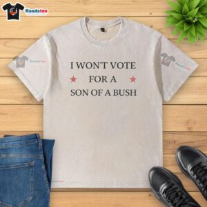 Drew Barrymore wearing a I Won't Vote For A Son Of A Bush t-shirt at an event, promoting political awareness and expression.
