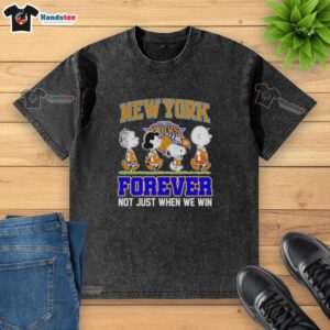 Alt Text: Official Peanuts Characters x MLB New York Knicks Forever T-shirt featuring playful graphics and team spirit.