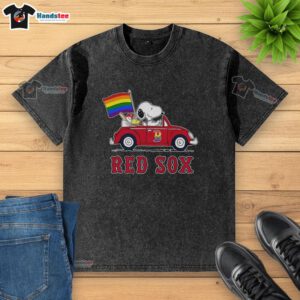 Alt Text: Premium Boston Red Sox x Snoopy and Woodstock driving a car with a rainbow flag on a washed t-shirt design.