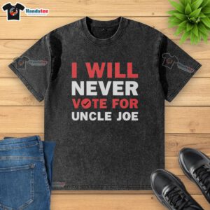 Premium I Will Never Vote For Uncle Joe Biden washed t-shirt featuring bold text for political statement wear.