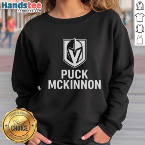 Premium Vegas Golden Knights ice hockey puck sweatshirt featuring the McKinnon logo, perfect for fans and collectors.