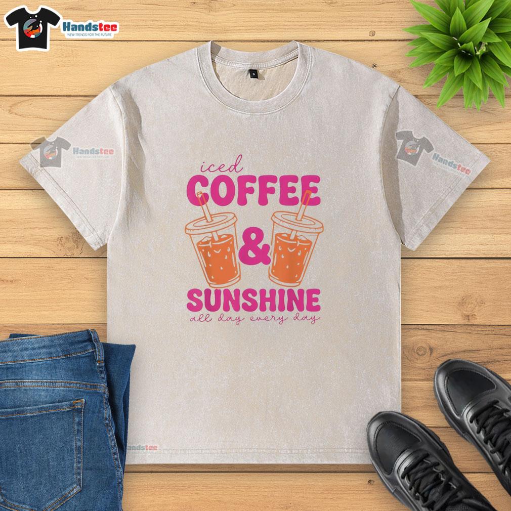 Graphic washed t-shirt featuring 'Pretty Orange Juice Iced Coffee and Sunshine All Day Every Day' design, perfect for summer.