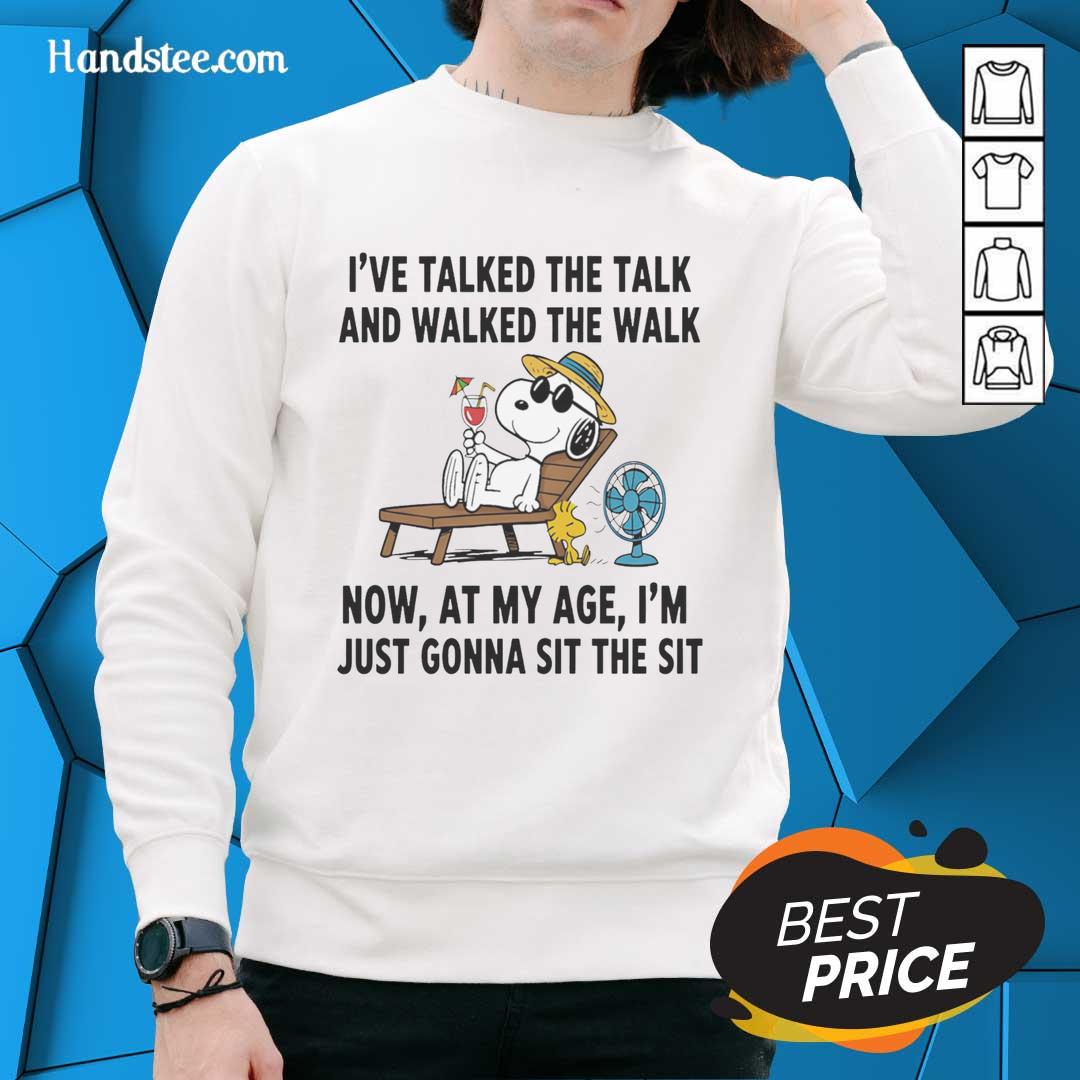Cozy Pretty Snoopy sweatshirt featuring a playful quote about aging and relaxation, perfect for casual wear.