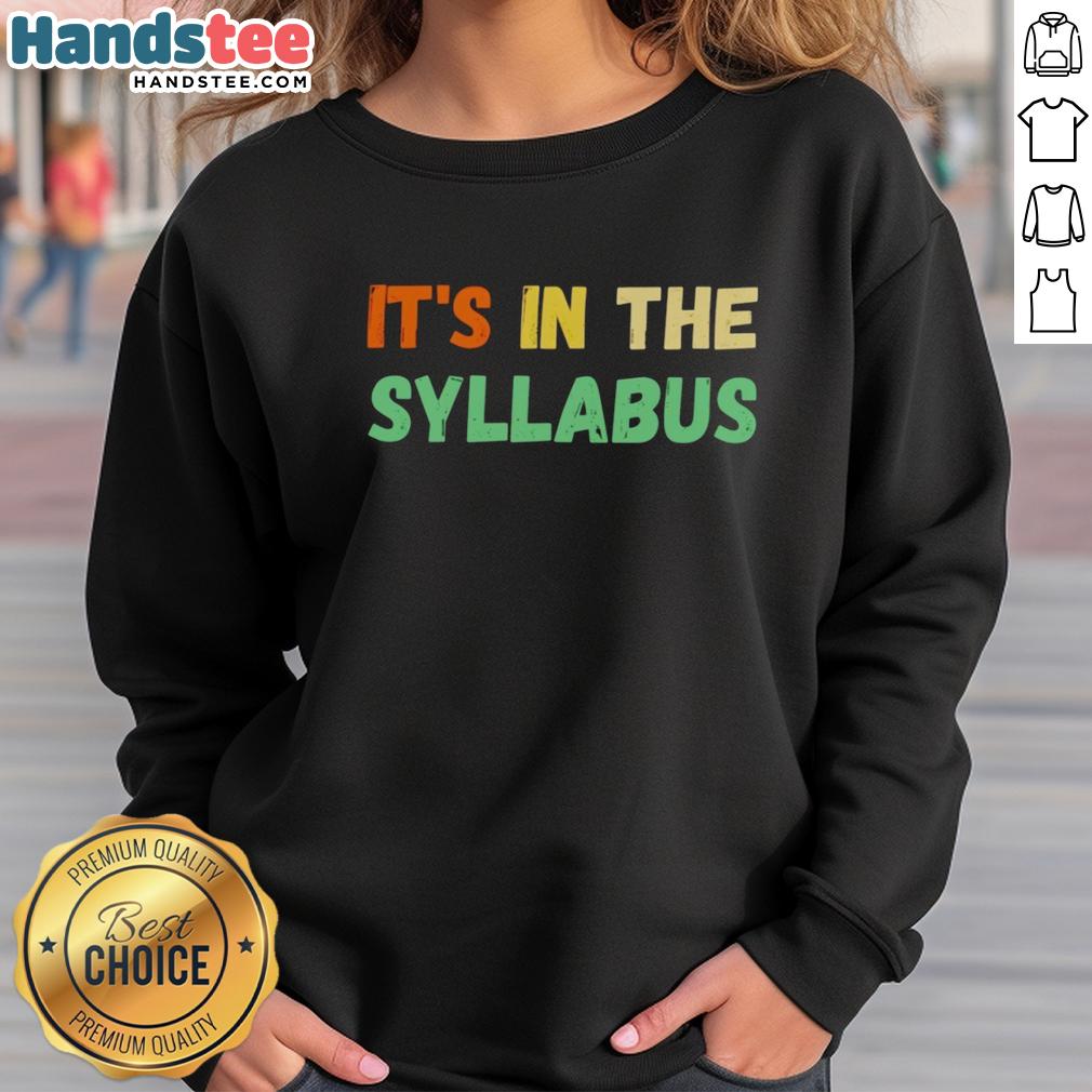 Cozy Nice It's In The Syllabus sweatshirt displayed on a hanger, perfect for casual wear and school spirit.