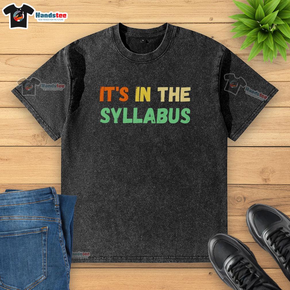 Nice It's In The Syllabus washed t-shirt displayed on a hanger, showcasing trendy casual wear for students.