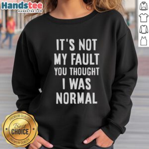 Original 'It's Not My Fault You Thought I Was Normal' sweatshirt with bold text design, perfect for casual wear.