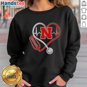Premium Nebraska Cornhuskers Heartbeat Love Nurse Sweatshirt in red, perfect for fans and healthcare workers.