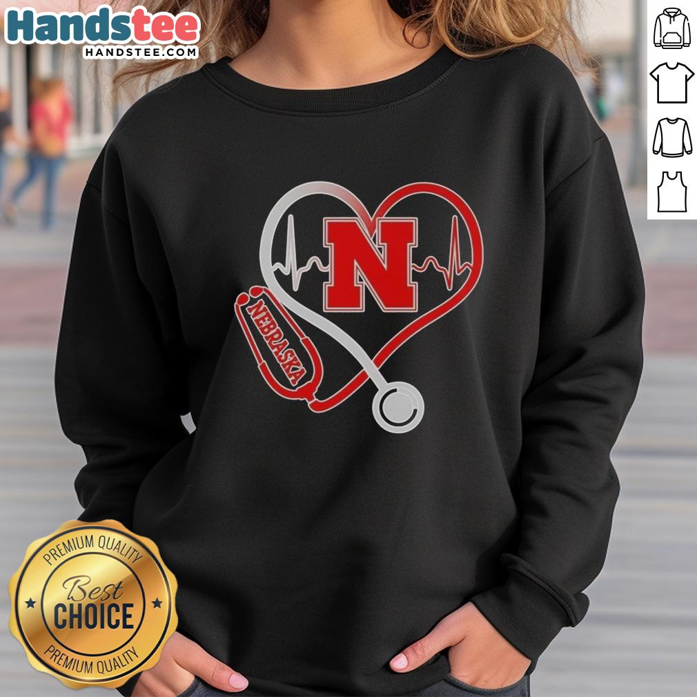 Premium Nebraska Cornhuskers Heartbeat Love Nurse Sweatshirt in red, perfect for fans and healthcare workers.