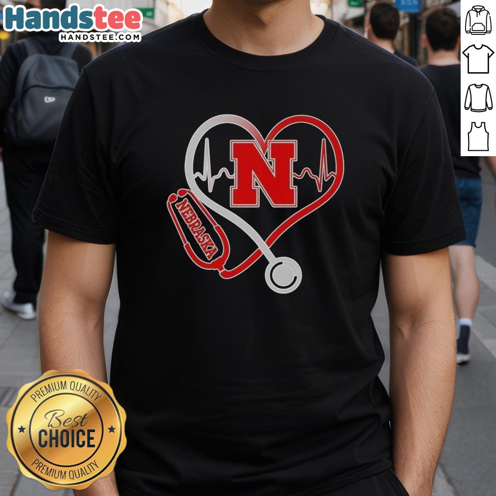 Alt Text: Premium Nebraska Cornhuskers Heartbeat Love Nurse T-Shirt featuring a vibrant design for dedicated fans and healthcare workers.