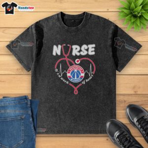 Alt Text: Premium Washington Wizards Nurse 'It's A Work Of Heart' Stethoscope Shaped Heart Washed T-Shirt for fans and healthcare workers.
