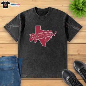 Retro washed t-shirt featuring Texas A&M Aggies logo and Howdy Aggieland Texas map design, perfect for fans.
