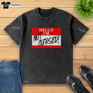 Funny washed t-shirt with 'Hello, I am not cursed' sign graphic, perfect for humor lovers and casual wear enthusiasts.