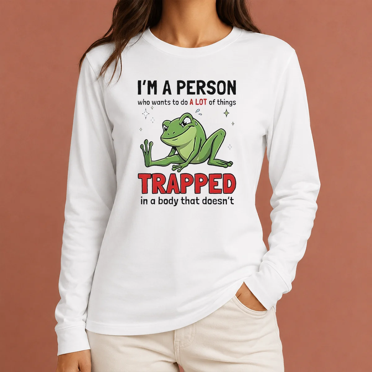Funny Frog I'M A Person WHO Wants To Do A Lot Of Things Trapped In A Body That Doesn'T Shi long sleeve shirt in green, front view