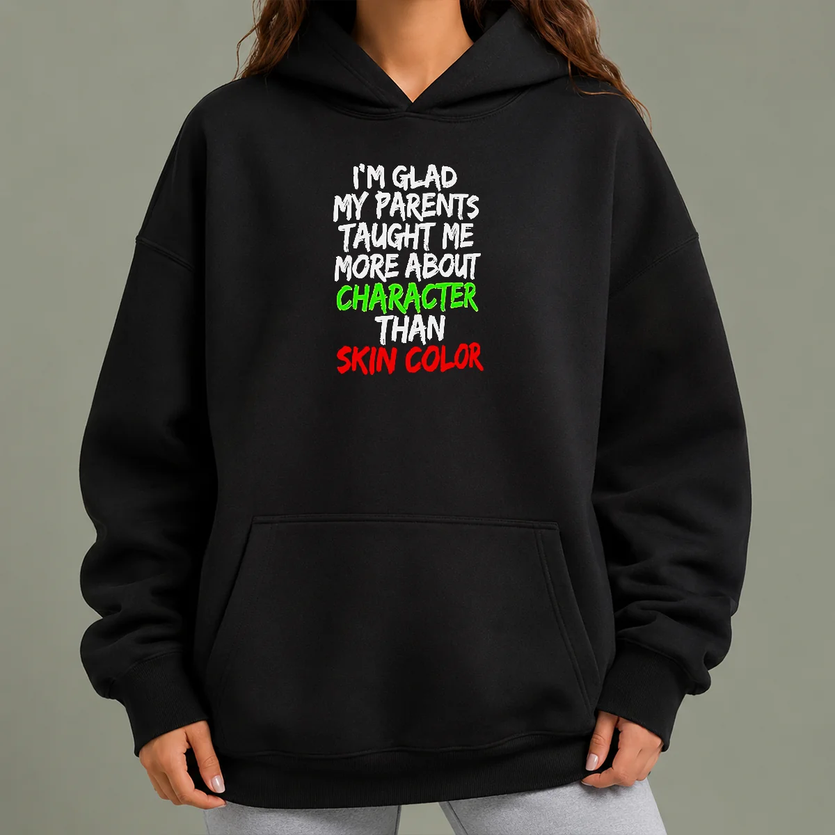 Good I'M Glad My Parents Taught Me More About Character Than Skin Color Hoodie in black, unisex pullover with front pocket and drawstring hood