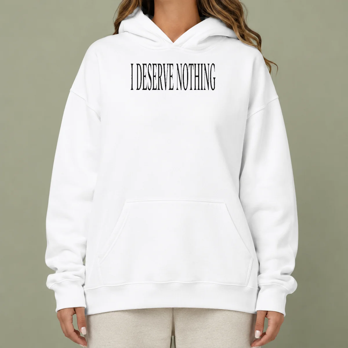 Hot I Deserve Nothing Waste Of Space Hoodie in black, front view with bold white text graphic