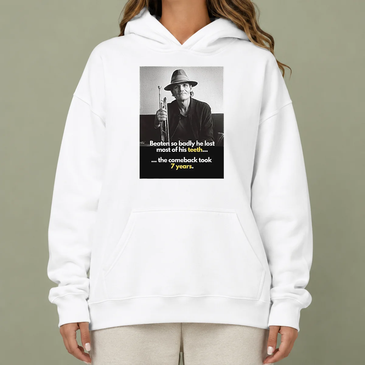 Pretty Beaten So Badly He Lost Most Of His Teeth The Comeback Took 7 Years graphic hoodie in black with front pocket and drawstring hood