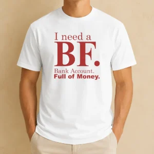 Pretty I Need A BF Bank Account Full Of Money t shirt in black, front view with bold white text