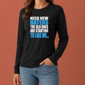 Pretty Need New Haters The Old Ones Are Starting To Like Me Quote long sleeve shirt in black, front view with bold typography